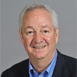 Headshot of Moderator: Tom Rogers